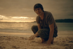 Brian Cox examining Sand